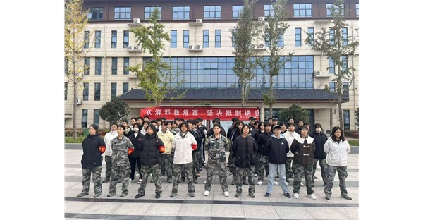 校地联动筑防线！郑州时代科技中专联合新村镇开展反邪教宣传活动